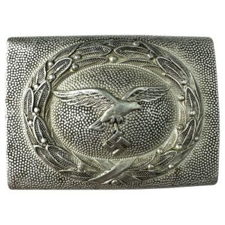 WWII German Luftwaffe aluminum belt buckle by Gustav Brehmer, featuring an eagle clutching a swastika within a laurel wreath design.