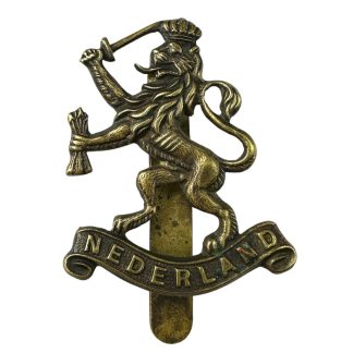 Original WWII British made 'Nederland' cap insignia