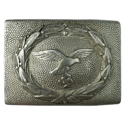 Original WWII German Luftwaffe belt buckle by Lind & Meyrer – aluminum construction featuring an eagle clutching a swastika within a detailed laurel wreath design.