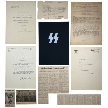 "Rare historical documents related to SS-Brigadeführer Hinrich Schuldt and SS-Regiment ‘Langemarck’, including Nazi-era official letters, SS insignia, military orders, and newspaper clippings. Features wartime correspondence signed by Heinrich Himmler and Adolf Hitler, detailing the renaming of the 4th SS Infantry Regiment to ‘Langemarck’. WWII German SS memorabilia, Third Reich artifacts, and Waffen-SS history."