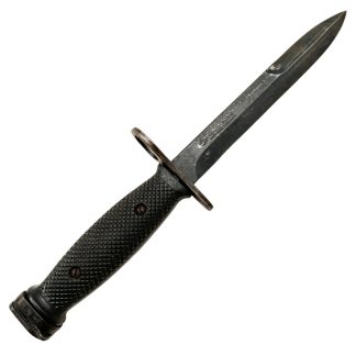 US M7 Colt bayonet from the Vietnam War, manufactured by Colt, featuring a black metal blade and a black plastic handle. Commonly used with the M16 rifle. Authentic military artifact with historical significance.