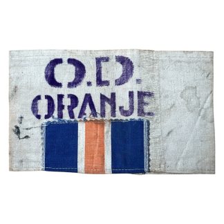 Rare armband of the Dutch Interior Forces (O.D. Oranje), worn by members of the Ordedienst just after liberation in 1945. White cloth with hand-stamped purple letters and sewn orange-white-blue ribbon. Authentic collectible from the Dutch resistance movement.