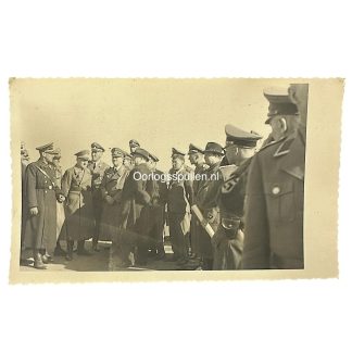 Historical WWII photo of Adolf Hitler inspecting SS officers and Wehrmacht personnel, circa early 1940s, possibly in Germany or occupied Europe — rare Nazi-era military gathering