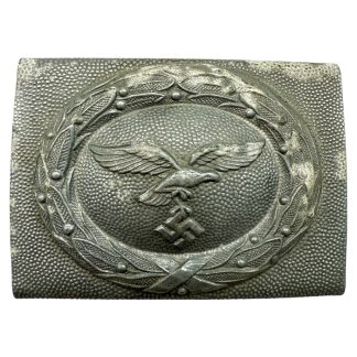 Original WWII German Luftwaffe parade belt buckle, light metal construction with eagle and swastika emblem surrounded by laurel wreath – authentic World War Two militaria collectible for Luftwaffe and German uniform collectors.