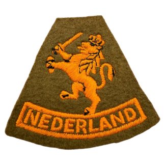Original WWII Dutch Princess Irene Brigade insignia, 1944 England-made uniform patch with orange Dutch lion and 'Nederland' text, rare World War Two Allied militaria collectible.
