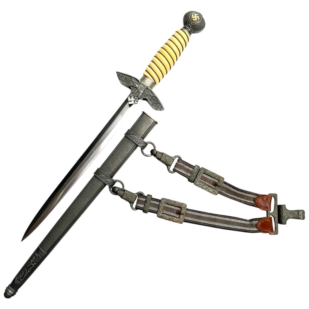 Original WWII German Luftwaffe officer’s dagger 2nd model with scabbard and hanger, produced by Tiger Solingen – rare World War Two military collectible for dagger and militaria collectors.
