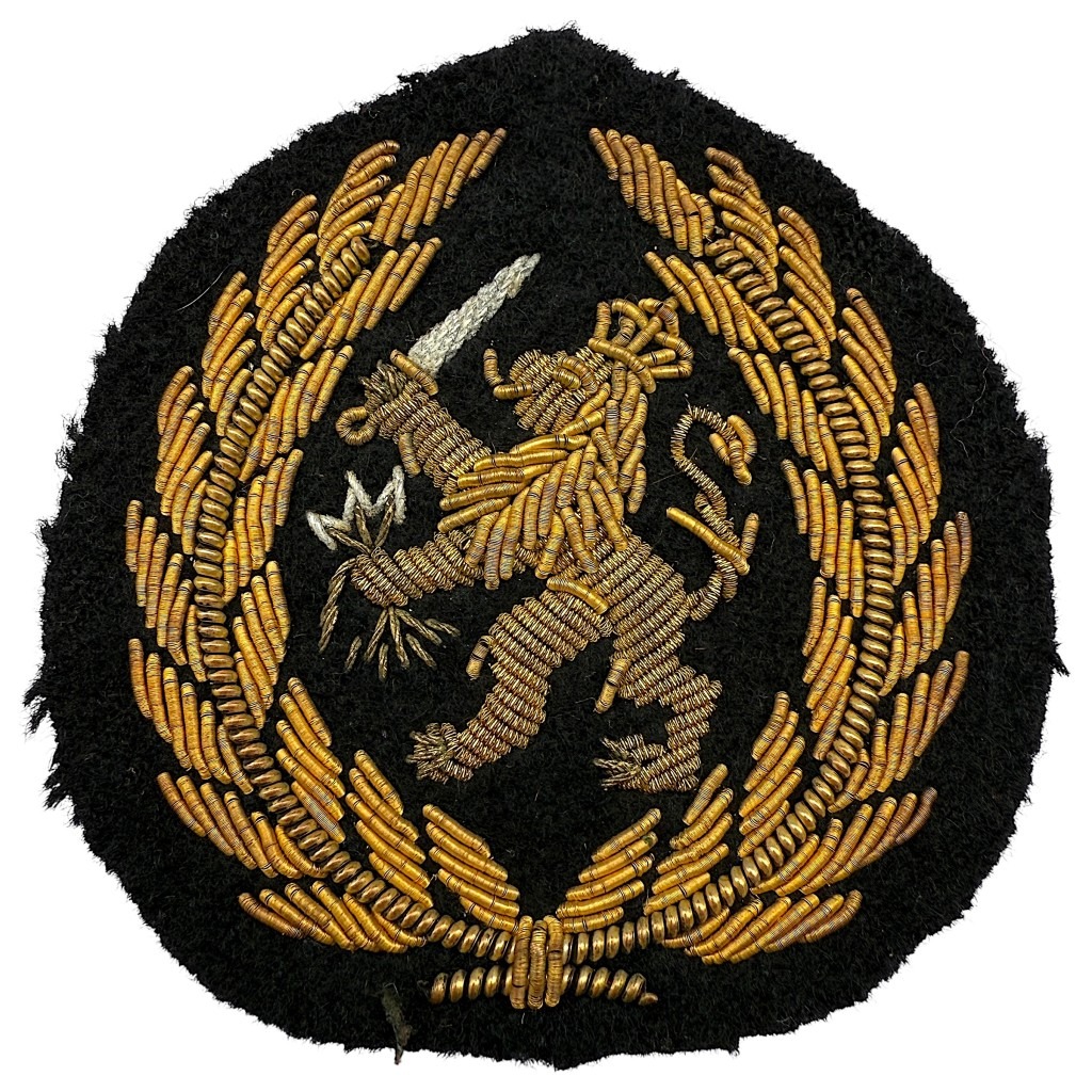 Original Dutch KNIL (1945-1949) officers cap insignia