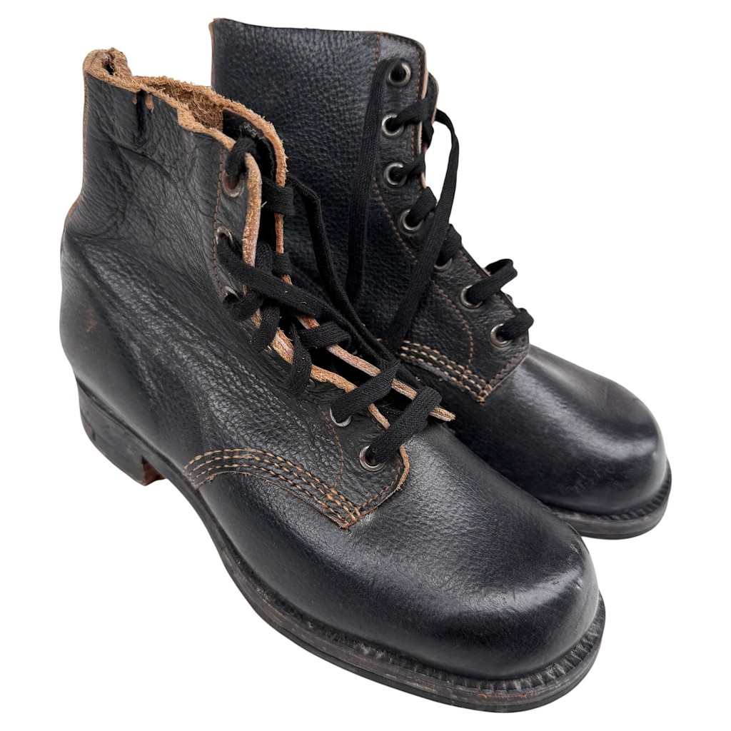 Original WWII German Hitlerjugend ‘Schnürschuhe’ shoes, authentic black leather lace-up boots with coarse grain structure, nailed leather soles, and metal heel plates. Rare and well-preserved Hitler Youth footwear, essential for WWII militaria and Hitlerjugend collectors.