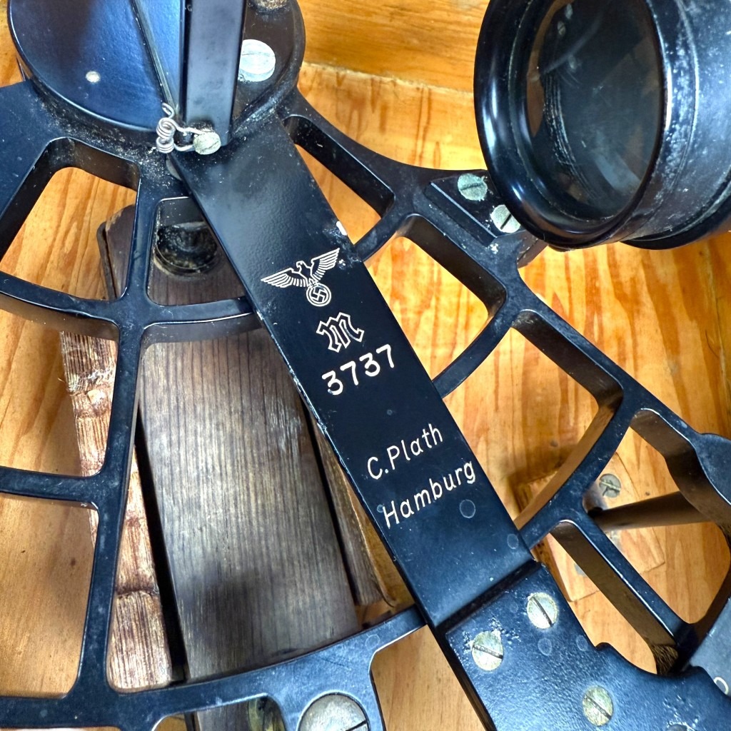 Original WWII German Kriegsmarine sextant by C. Plath Hamburg with engraved eagle and swastika Kriegsmarine "M" mark, serial number 3737, complete with wooden box, sun filters, and leather handle – rare World War II naval navigation instrument for Kriegsmarine militaria collectors.