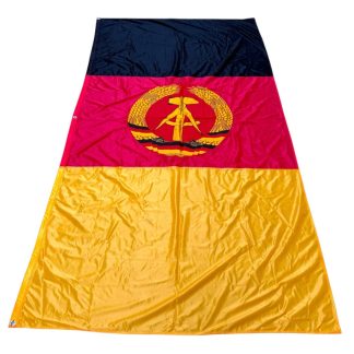 Large original East German DDR flag (235 x 125 cm) with 1959–1990 state emblem featuring hammer, compass, and rye wreath, double-sided construction; ideal for DDR, NVA, and Cold War militaria collectors.