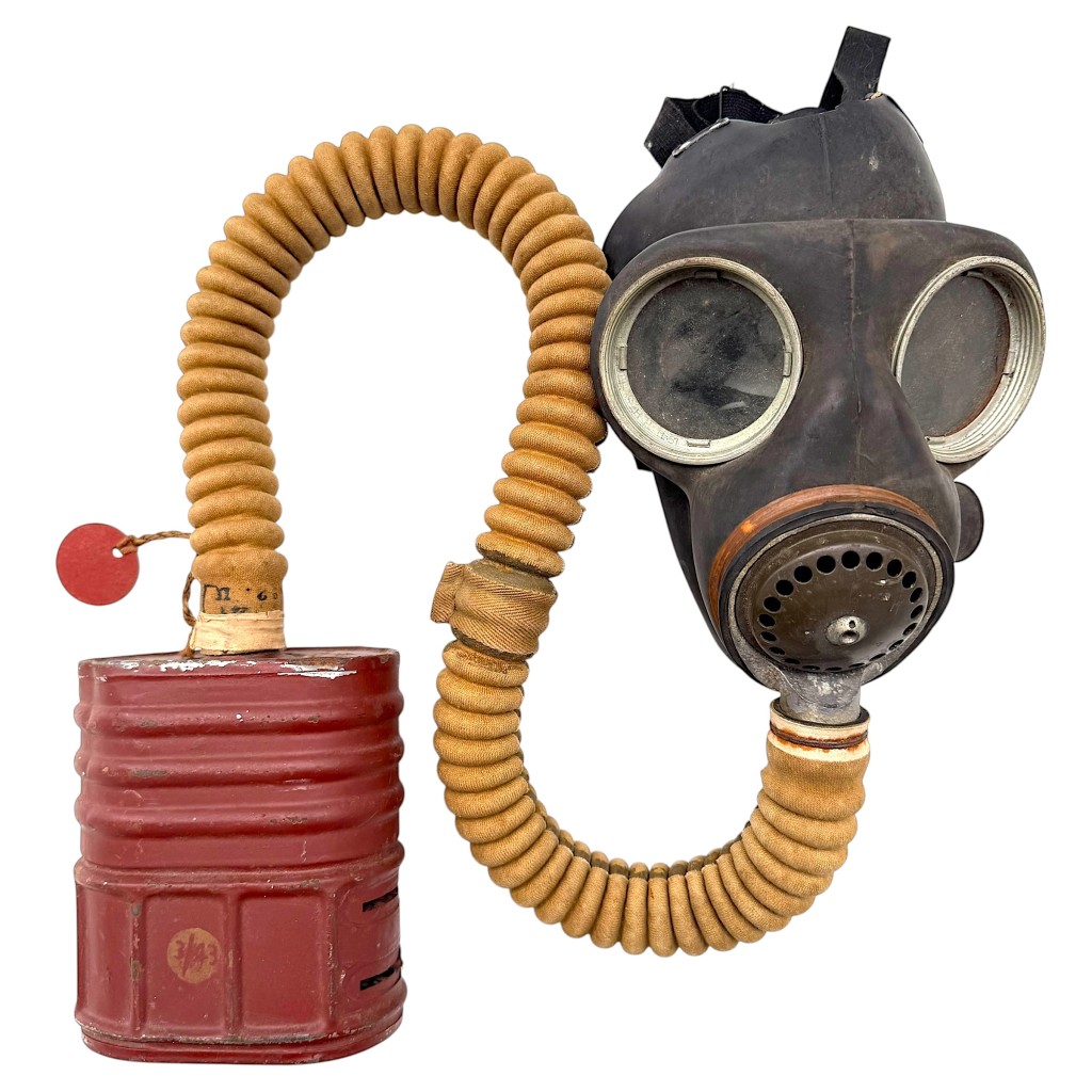 Original British WWII gas mask No.4A, produced by Barringer Wallis & Manners Ltd Mansfield in 1938, with red metal filter canister, rubber mask, and fabric hose – authentic World War Two respirator collectible.