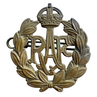 Original WWII RAF brass cap badge with King’s Crown and laurel wreath insignia for Royal Air Force collectors.