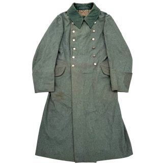 Original German WWII Wehrmacht Heer M35 overcoat by Töpler München, field-grey wool greatcoat with early-war dark green collar, double-breasted metal buttons, stamped interior markings, worn by member of Infantry Regiment 40 — authentic collectible German military uniform.