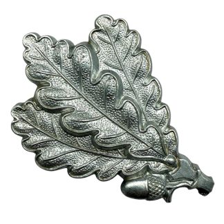 Original WWII German Wehrmacht Jäger oak leaf metal cap insignia with acorn – rare WW2 German military badge for collectors of Third Reich insignia and headgear.
