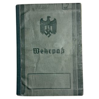 Original German WWII Wehrpass military service booklet, issued 1936 by Wehrbezirkskommando Speyerbrücken, belonging to Unterarzt Benno Dr. Illsung of the Wehrmacht medical corps, complete with stamps, signatures, and photo – rare collectible for Wehrpass and World War II document collectors.