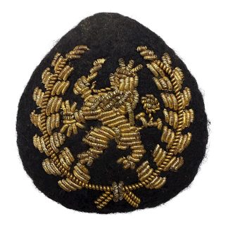 Original Dutch KNIL (1945-1949) cap insignia