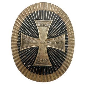 Original WWI Prussian Landwehr Tschako plate featuring the Landwehr Cross with “Mit Gott – Für König und Vaterland – 1813,” brass oval helmet badge with radiating ribbed design, authentic German Imperial militaria collectible.