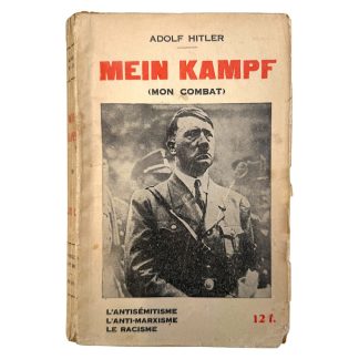Original 1930s French edition of the book “Mein Kampf (Mon Combat)” with vintage paper cover, featuring printed title text and a historical photograph of a man in uniform; collectible pre-war publication sought after by WWII book collectors.