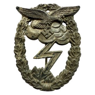 Original WWII German Luftwaffe Erdkampfabzeichen Ground Assault Badge with eagle, lightning bolt and oak leaf wreath, used condition with functional pin, collectible Luftwaffe medal for WWII militaria collectors.