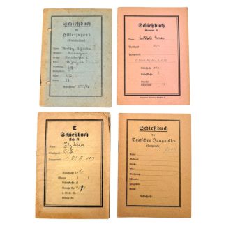 Original set of four WWII German shooting booklets (Schießbuch), including Hitler Youth, Deutsche Jungvolk and Wehrmacht examples, featuring handwritten notes, stamps, training records and period documentation; rare World War II firearms training manuals for militaria and historical document collectors.