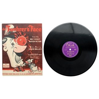 Original WWII US anti-Hitler Walt Disney ‘Der Fuehrer’s Face’ set with 1942 sheet music and Okeh record. Rare World War II propaganda collectible featuring Disney artwork and Donald Duck illustration, highly sought after by vintage Disney and WWII memorabilia collectors.