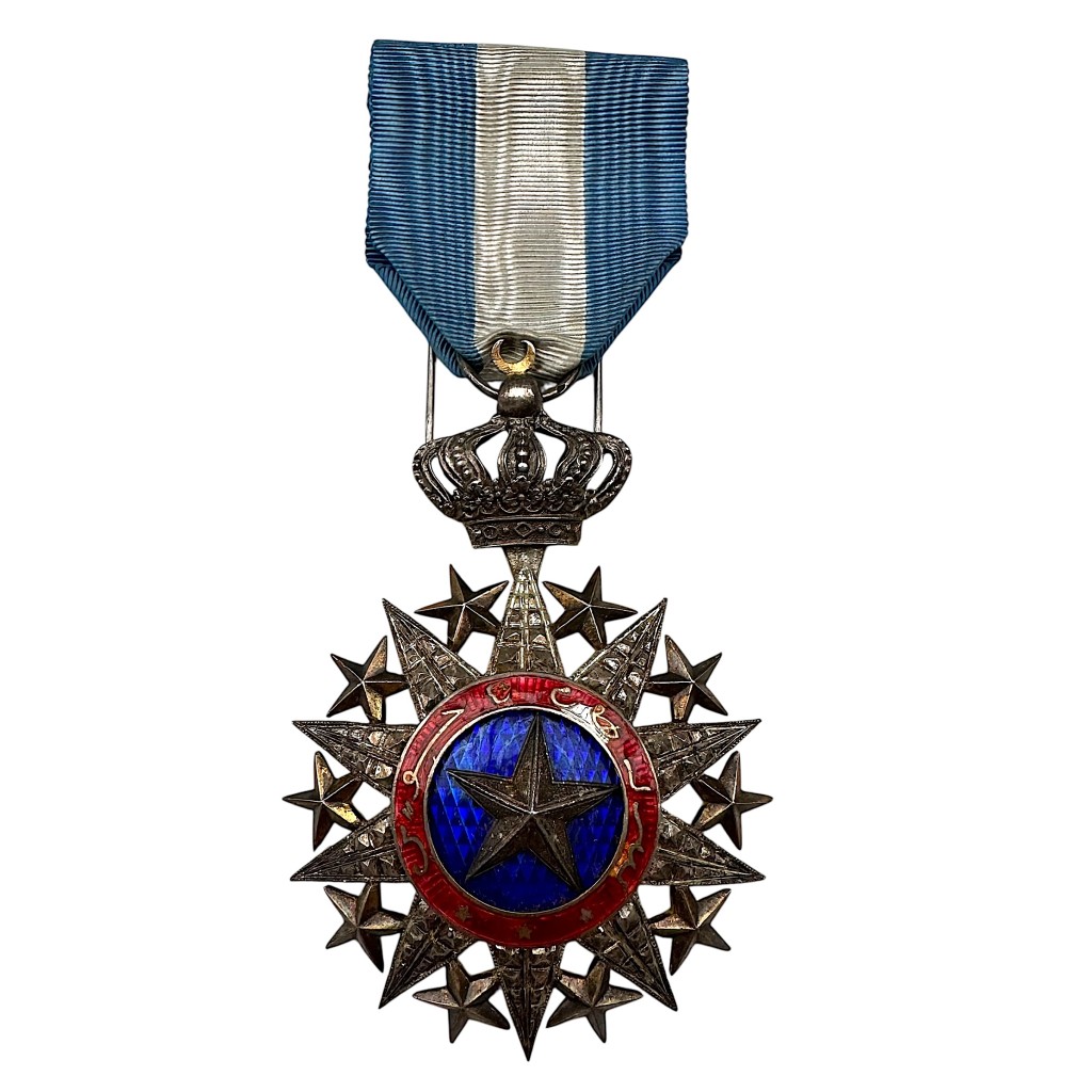 Colonial Order of Nicham El Anouar medal, silver knight’s star with blue and red enamel, Arabic inscription, royal crown and crescent, original blue and white ribbon, rare 1887 Djibouti medal for collectors.
