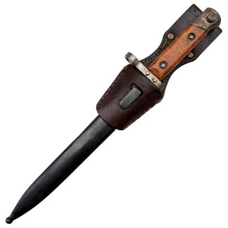 Original Austrian M1895 WW1 bayonet with leather scabbard for Mannlicher rifle, World War I military collectible with straight blade, wooden grip and inspection stamps, authentic Austro-Hungarian army trench weapon.