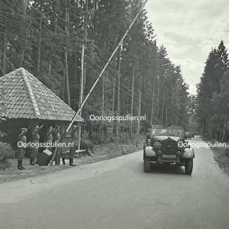 Original WWII German photo positive showing SS guards saluting Adolf Hitler’s arrival at the Wolfsschanze headquarters, rare unpublished Third Reich military photograph, Wolf’s Lair collector’s item.