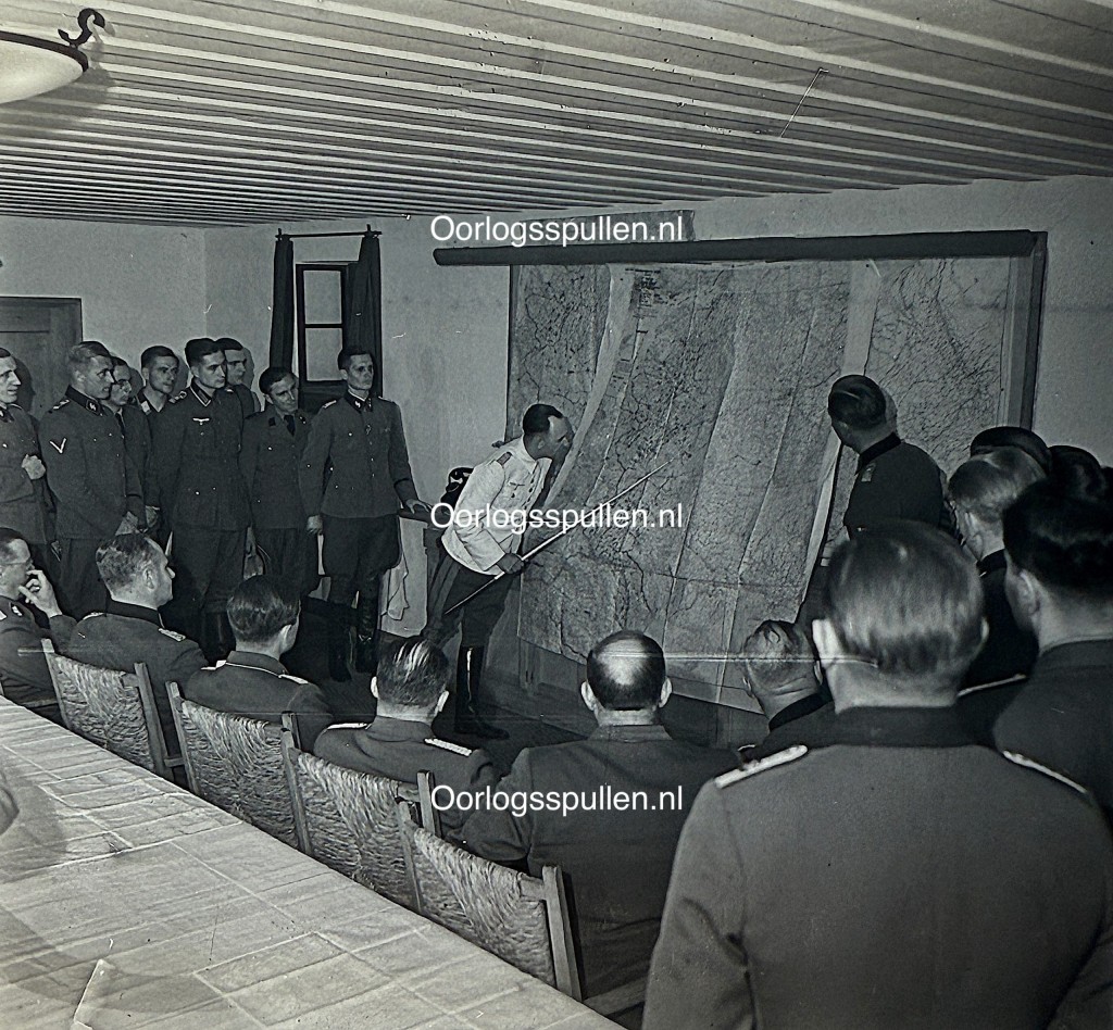 Original WWII German photo positive showing operational briefings at the Wolfsschanze with Heinrich Himmler and senior German officers studying large staff maps, rare unpublished Third Reich headquarters command meeting photograph for Wolfsschanze historians.