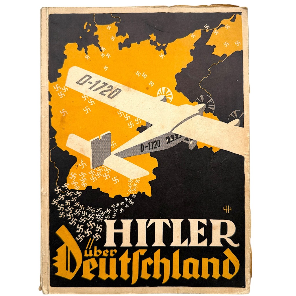 Rare original 1932 German propaganda book Hitler über Deutschland, complete copy with original illustrated cover, fold-out panoramic photo plates, black-and-white photographs of mass rallies and stadium crowds, published by Heinrich Hoffmann during the Weimar Republic, historic political memorabilia for collectors, museums, and researchers.