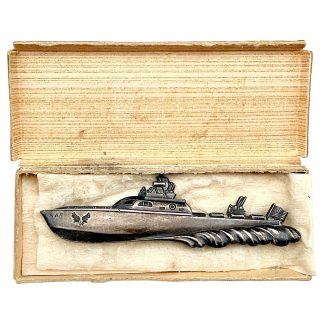Original USAF Crash Boat Badge from the period of the Korean War (early 1950s), made of sterling silver and preserved in its original cardboard box with protective insert.