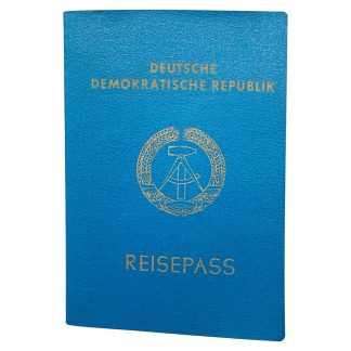 Original DDR passport Reisepass issued in Strausberg 1988, German Democratic Republic travel document with stamps and visa, Cold War collectible for East Germany and DDR history collectors.