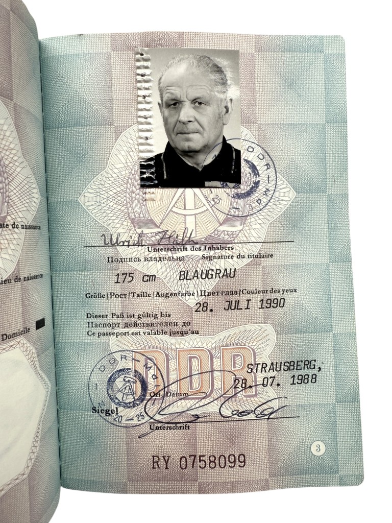 Original DDR passport Reisepass issued in Strausberg 1988, German Democratic Republic travel document with stamps and visa, Cold War collectible for East Germany and DDR history collectors.