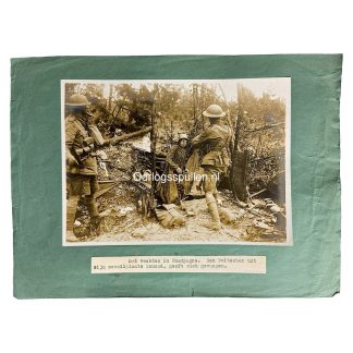 Original First World War photograph showing a German soldier surrendering during the Champagne battles, WW1 trench warfare scene with Allied soldiers, barbed wire and destroyed forest, mounted period photo 18 x 13 cm, authentic World War I military collectible for WW1 history collectors and militaria enthusiasts.