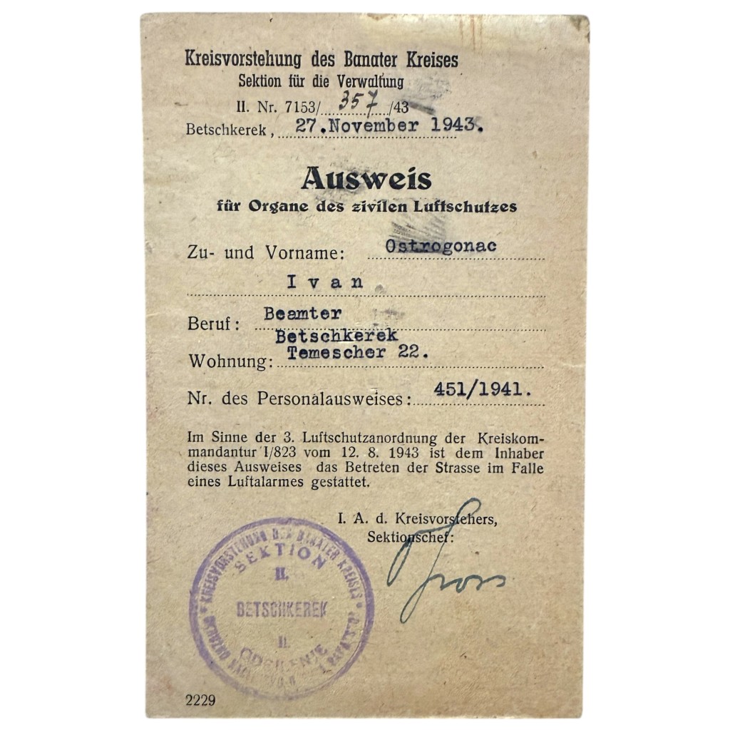Original WWII German Ausweis for civil air defense issued in 1943 in Betschkerek (Banat), named to Ivan Ostrogonac, complete with official stamp and signature, German occupation document from World War II, rare Luftschutz identification card for collectors.