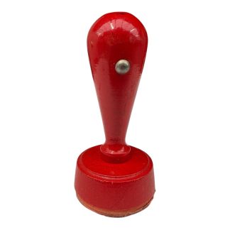 Original WWII German Gestapo stamp with red wooden handle, featuring the Reich eagle with wreath and swastika and the inscription “Geheime Staatspolizei” in relief, authentic Nazi-era administrative stamping device, rare militaria collectible for serious World War II and Third Reich collectors.