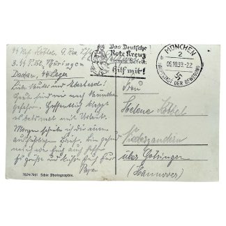 Original SS Feldpost postcard from 1939 sent by an SS-Rottenführer stationed at SS-Lager Dachau, postmarked Munich “MÜNCHEN 2 – Hauptstadt der Bewegung,” featuring Red Cross motif; historically documented WWII SS Totenkopf-Standarte 3 Thüringen related German military and concentration camp ephemera for advanced collectors.