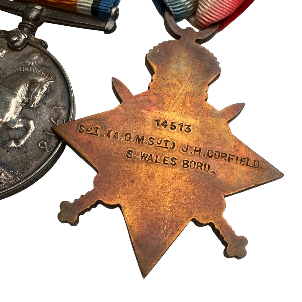 Original First World War British medal trio to Sgt J.H. Corfield, South Wales Borderers – 1914–15 Star, British War Medal and Victory Medal, named and engraved, complete with ribbons, WW1 military medals for collectors, British Army Great War memorabilia.