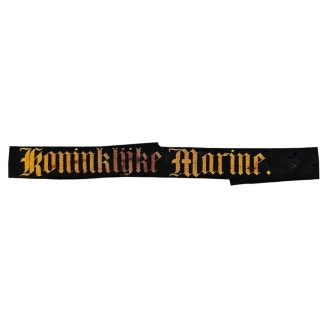 Origineel pre-1940 Koninklijke Marine mutslint met goudgeborduurde tekst “Koninklijke Marine”, zwart textiel cap tally Nederlands marine uniform, zeldzaam verzamelobject maritieme militaria.