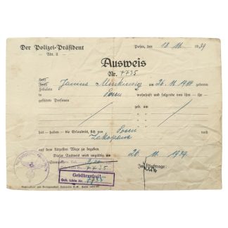 WWII German police travel permit Ausweis Nr. 7735 issued in Posen (Poznań) on 18 November 1939 to Janina Minkiewicz, authorizing travel from Posen to Zakopane, with official Polizei-Präsident stamps, “Gebührenfrei” marking, and visible fold wear – rare Third Reich occupation document from Reichsgau Wartheland, collectible World War II paper ephemera.