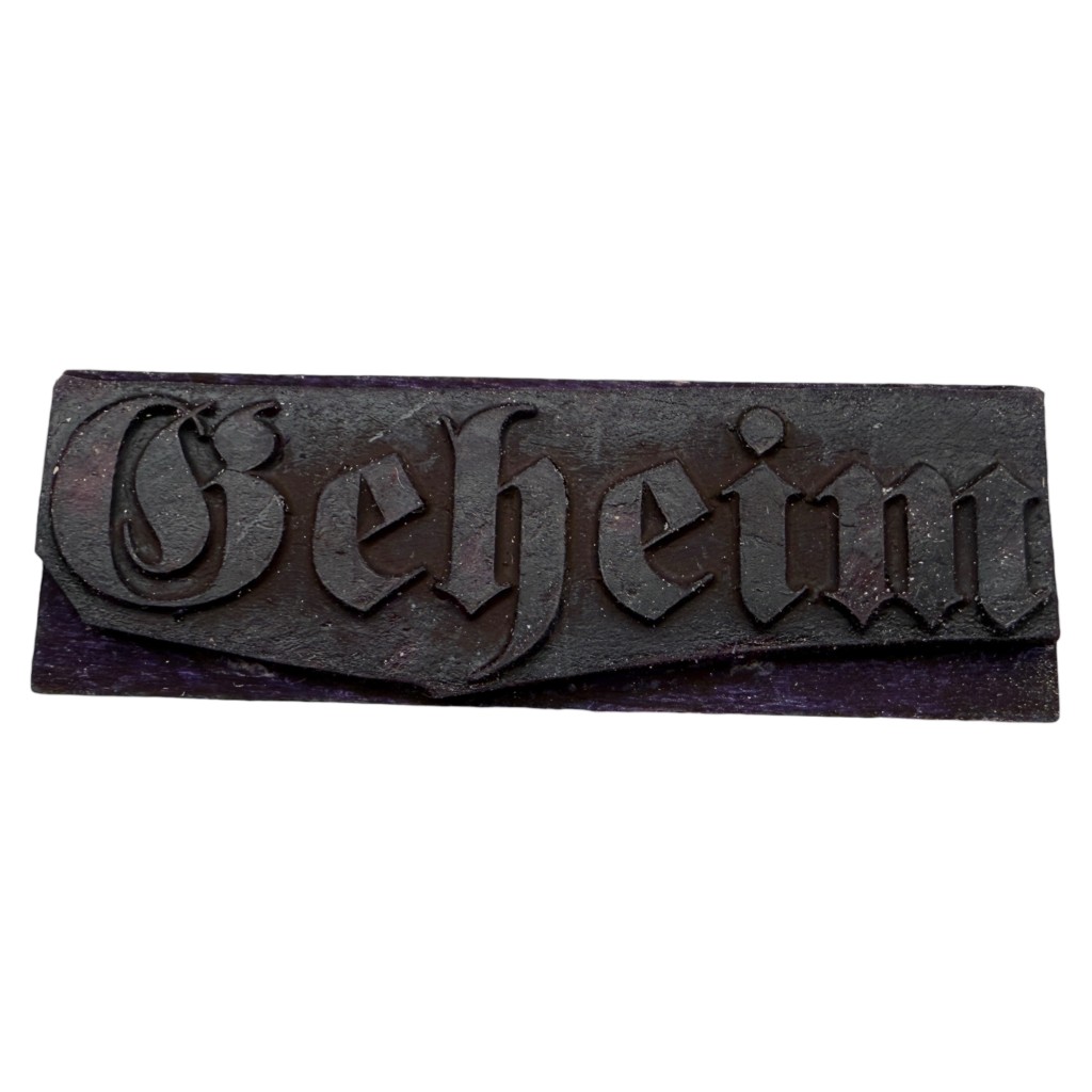 Original German WWII “Geheim” wooden stamp with Gothic lettering, authentic Third Reich militaria document marking tool 1939–1945, rare German military secret stamp for collectors.
