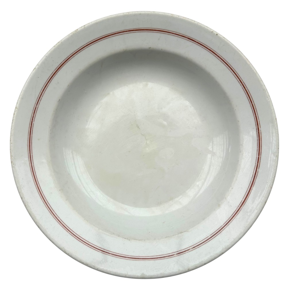 Original 1941 German Kriegsmarine officers porcelain dinner plate, 30 cm diameter, white porcelain with double red rim stripe, underside marked with eagle over “M,” KPM factory stamp and date 1941, authentic WWII naval militaria collectible in good condition.