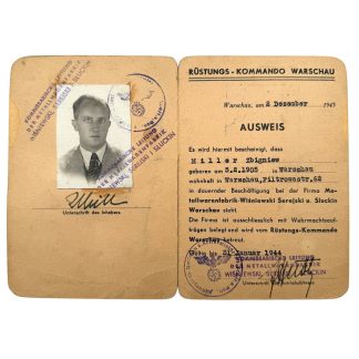 This original Ausweis is a German company and identification pass from 1943, issued by the Rüstungs-Kommando Warschau (of the Reich Ministry for Armaments and Munitions).