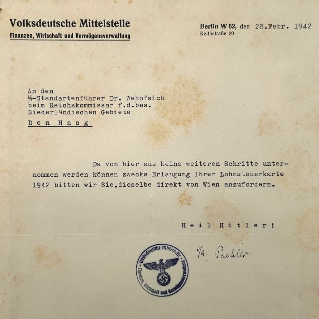 Original 1942 SS document from Volksdeutsche Mittelstelle Berlin, addressed to SS-Standartenführer in The Hague, with official Nazi seal – authentic WWII Third Reich collectible for serious SS and occupation-era document collectors.