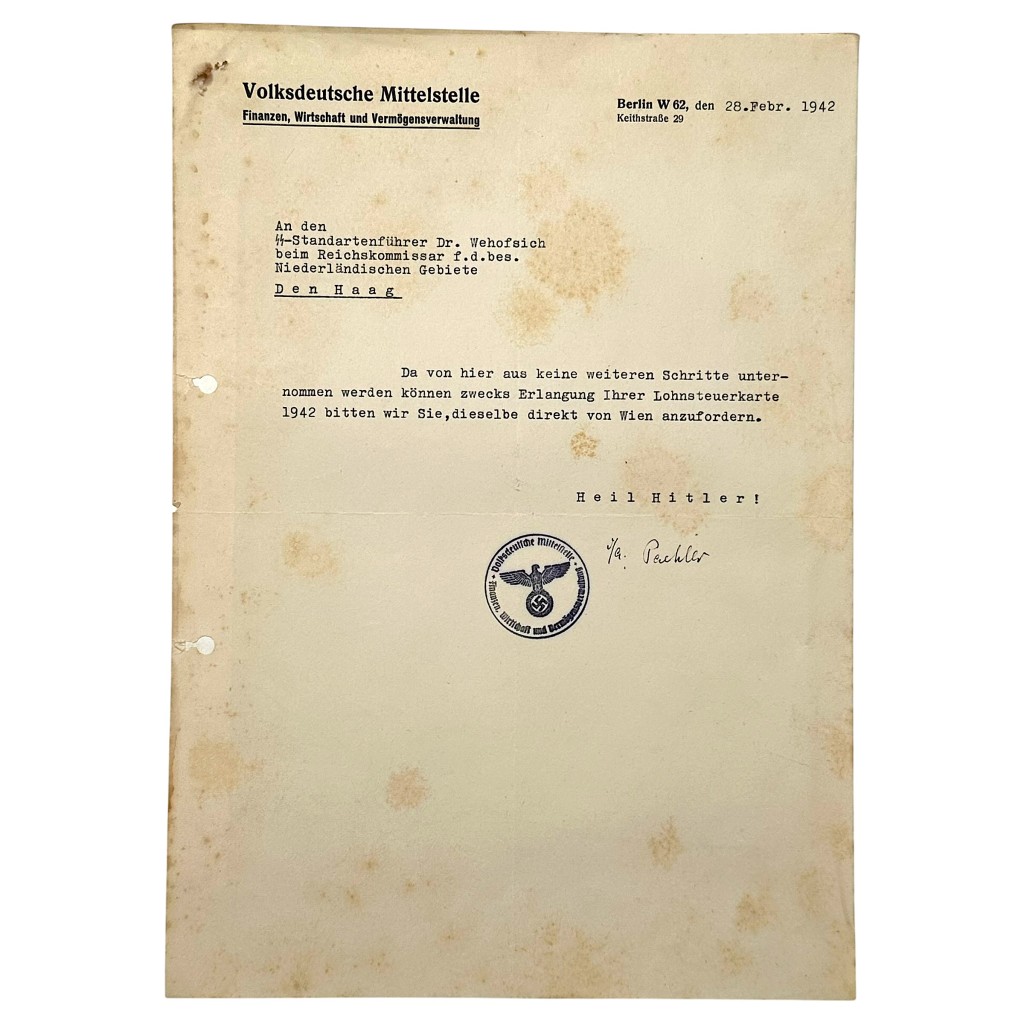 Original 1942 SS document from Volksdeutsche Mittelstelle Berlin, addressed to SS-Standartenführer in The Hague, with official Nazi seal – authentic WWII Third Reich collectible for serious SS and occupation-era document collectors.