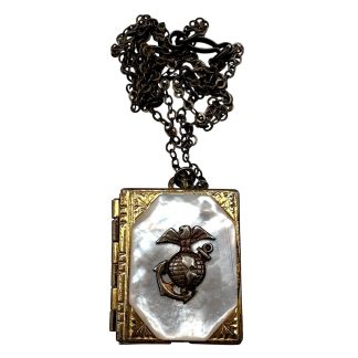 WWII USMC sterling silver locket necklace with mother of pearl inlay, Eagle Globe and Anchor emblem, original World War II United States Marine Corps jewelry, vintage Marine sweetheart pendant with photos, authentic USMC memorabilia for WWII militaria collectors.