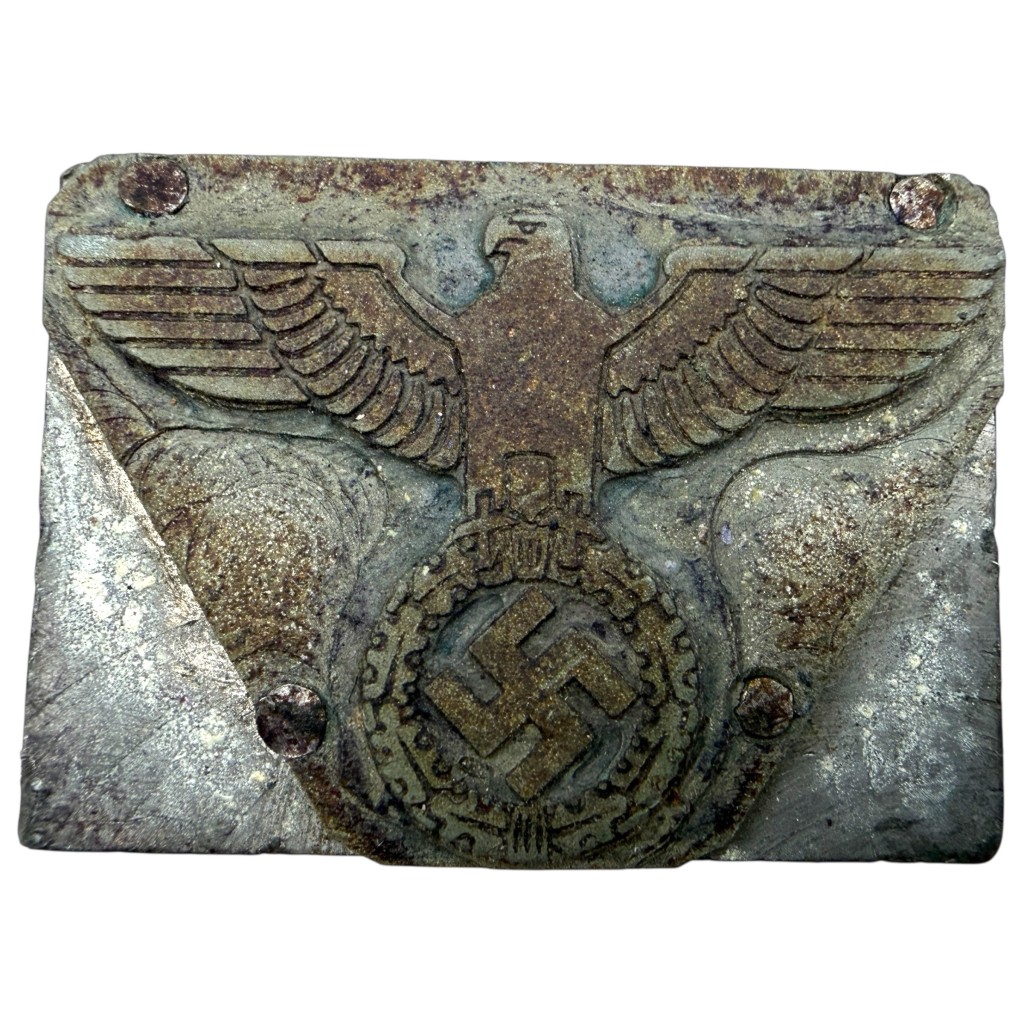 This original German metal stamp from the Second World War is a characteristic administrative object from the period of the Third Reich.