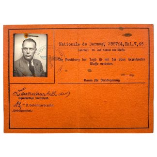 German WWII Waffenschein weapons permit Warsaw General Government orange document with portrait photo and police stamp