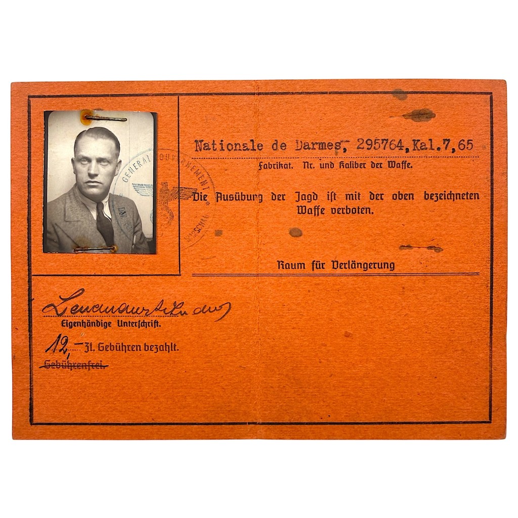 German WWII Waffenschein weapons permit Warsaw General Government orange document with portrait photo and police stamp