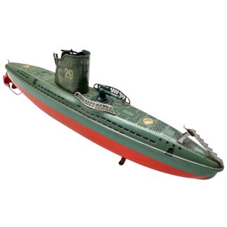 Original German Kriegsmarine U-boat toy WWII wind-up with key number 29 metal submarine collectible. Militaria